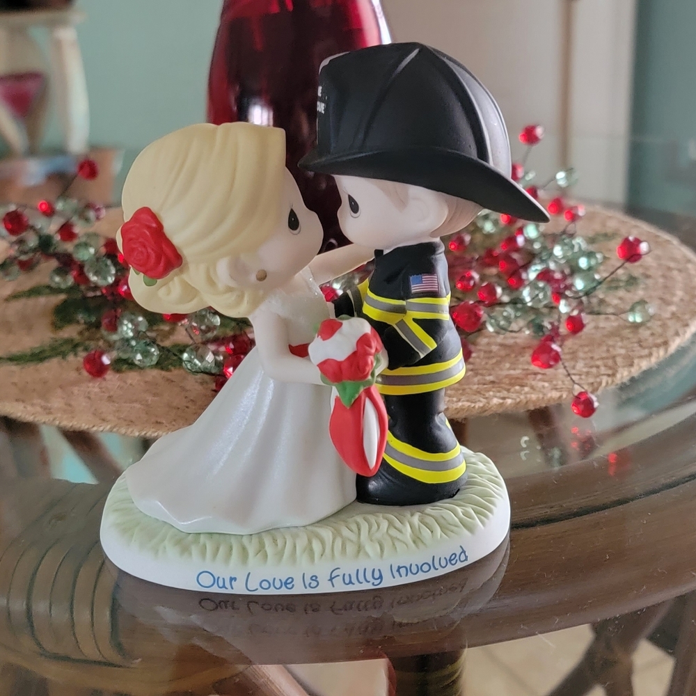 Precious Moments-Our Love is Fully Involved figurine.  Like new, numbered.